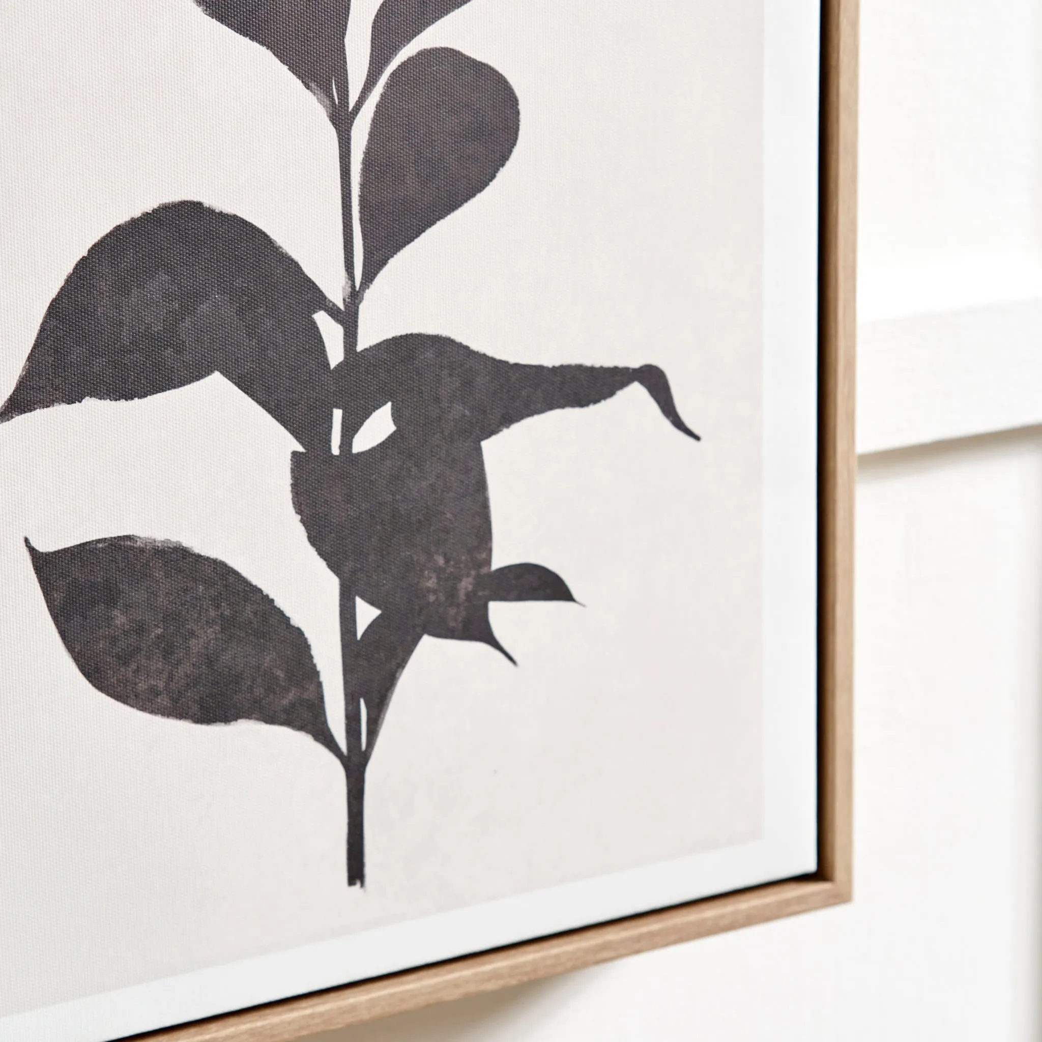 Natural and Black Leaf Print Canvases with Natural Frames