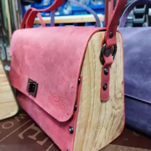 Red oil leather top handle bag and olive treee wood